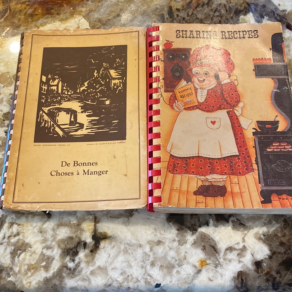 Two very old cookbooks one from Louisiana and one from Texas